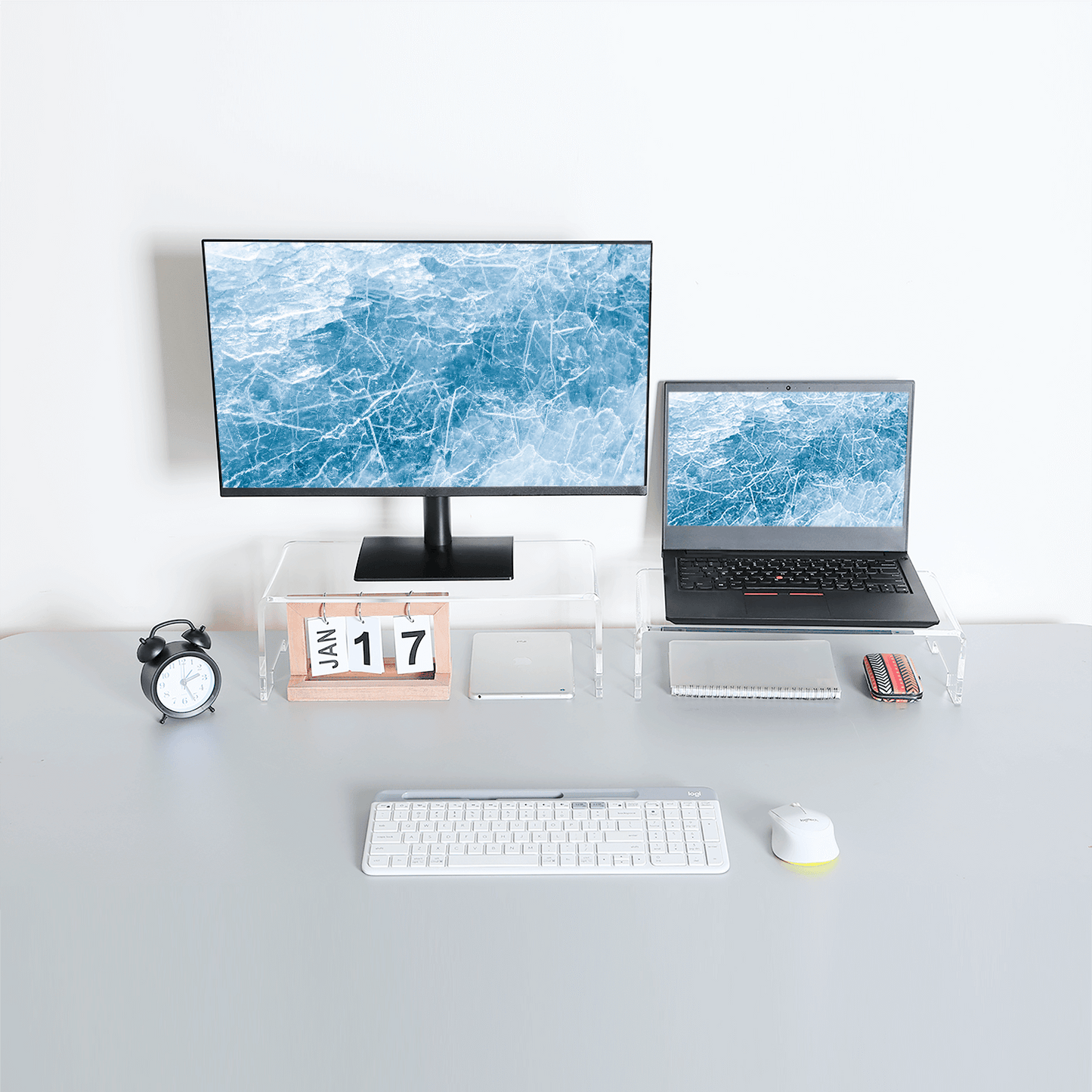 acrylic monitor stand declutters your desk