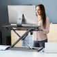 stand up at work with a standing desk converter Black