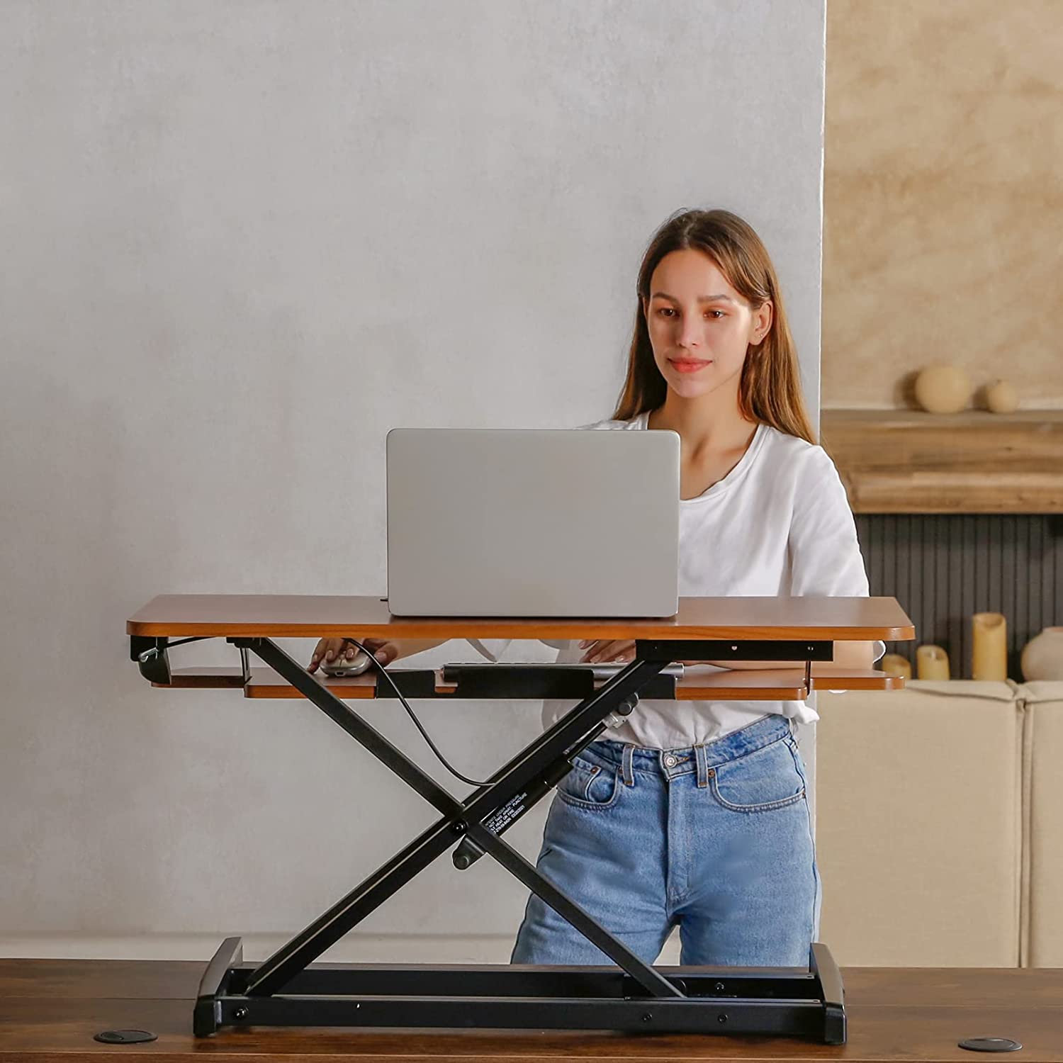 relive from a sedentary life with a desk riser Brown